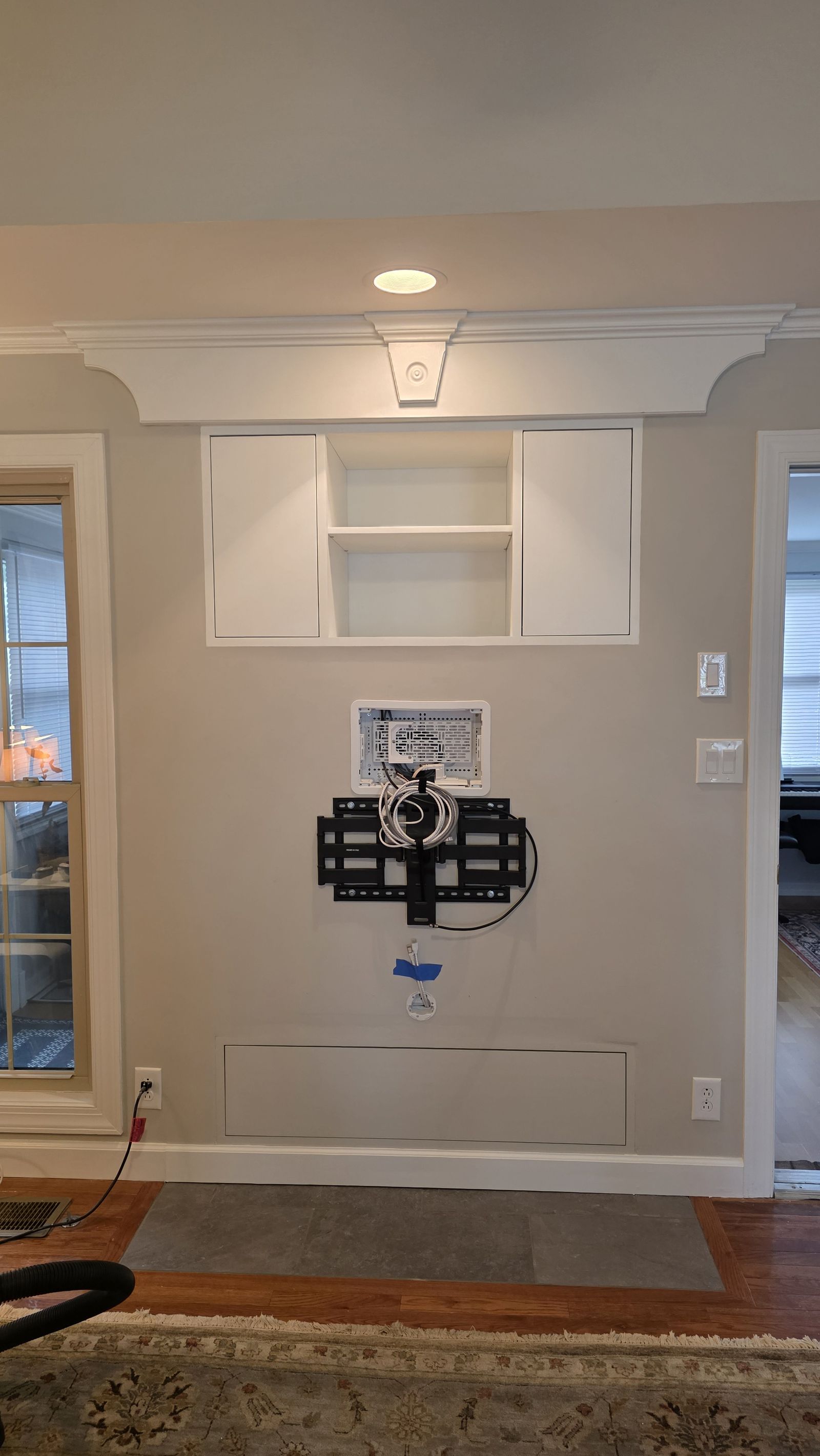 Painted built-in cabinets before the TV was mounted