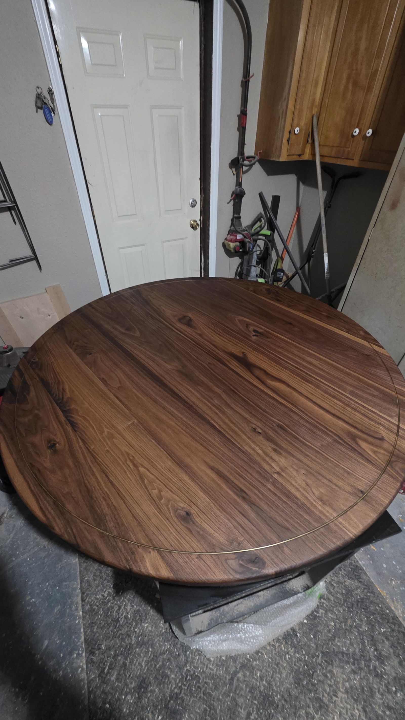 The sanded walnut top in the shop before finishing